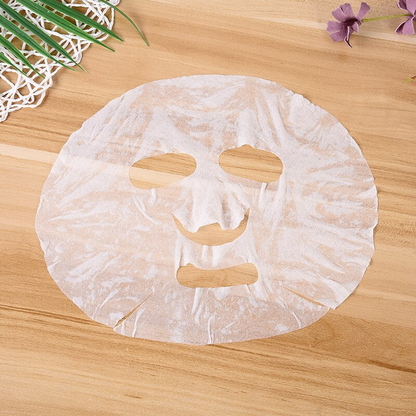 Masque Facial compressé jetable hydratant en coton.